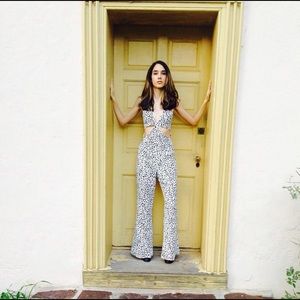 LINE AND DOT CUT OUT JUMPSUIT FROM NASTY GAL